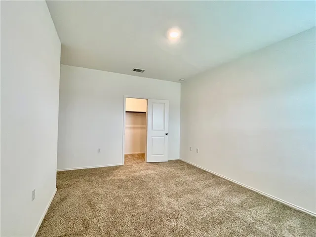 an empty room with a natural light