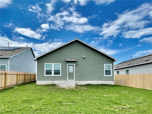 a house view with a garden space