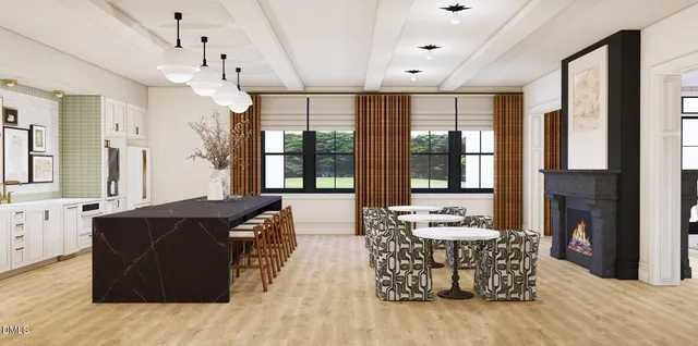 a living room with furniture and large windows