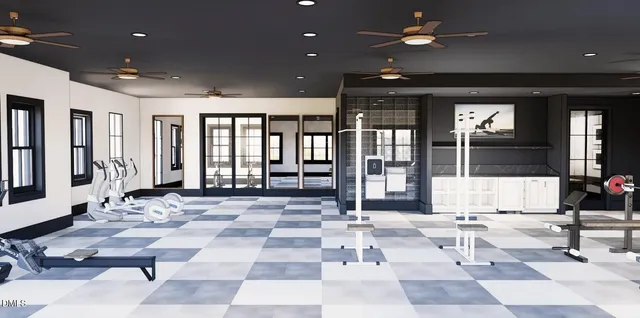 a living room with furniture and windows