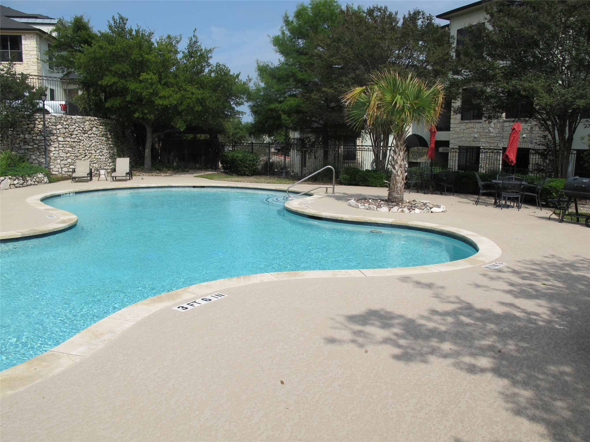 7701 Rialto Boulevard, Unit 1128 Austin, TX 78735 - Photo 32 of 35 a view of outdoor space yard swimming pool and patio