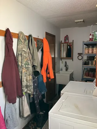 a bathroom with a bathtub and shower