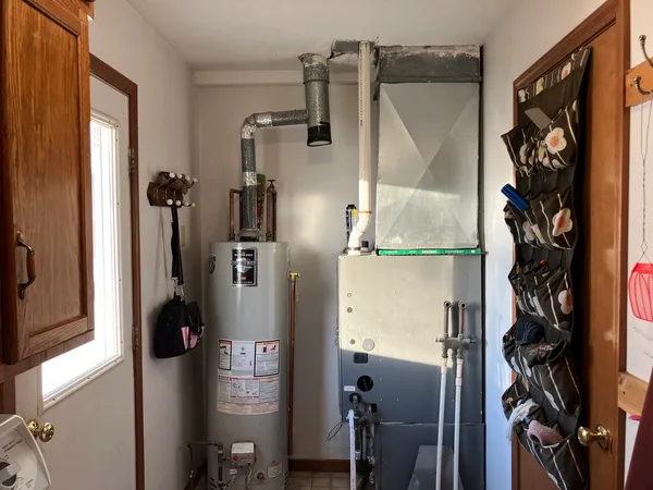 a bathroom with a shower and a mirror