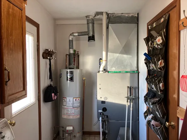 a bathroom with a shower and a mirror