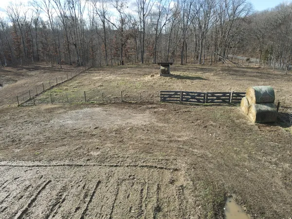 a bedroom with furniture and a book shelf