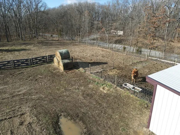 a bed room with furniture and window