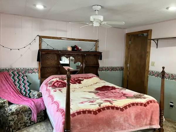 a bed with a bed and a mirror