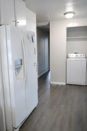 a view of a utility room with a sink