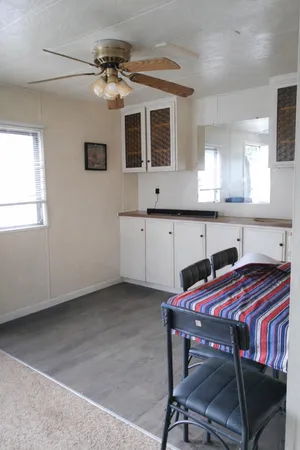 a kitchen with stainless steel appliances granite countertop a sink and cabinets