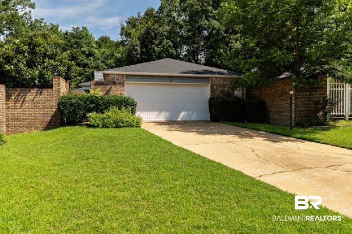 12 Stonebridge Court Mobile, AL 36608 - Photo 3 of 38 Garage with driveway