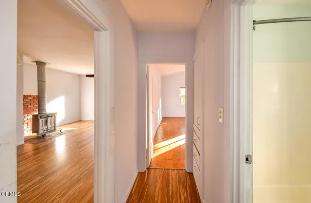 a view of a bathroom with a shower and a sink