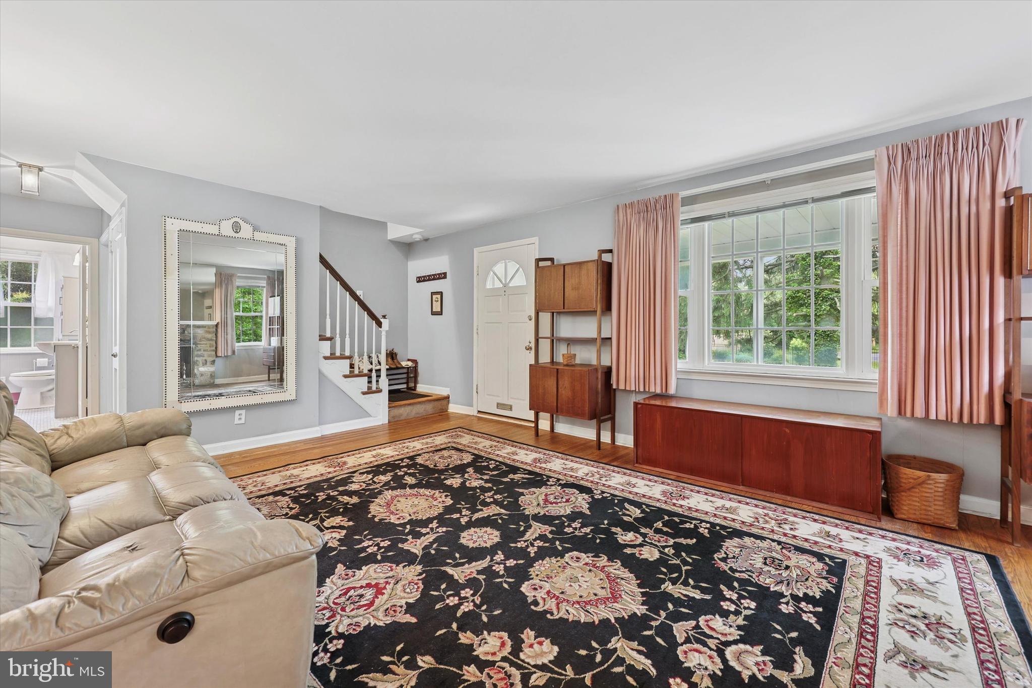 2107 Church Road Flourtown, PA 19031 - Photo 2 of 25 a bed room with a bed and a couch