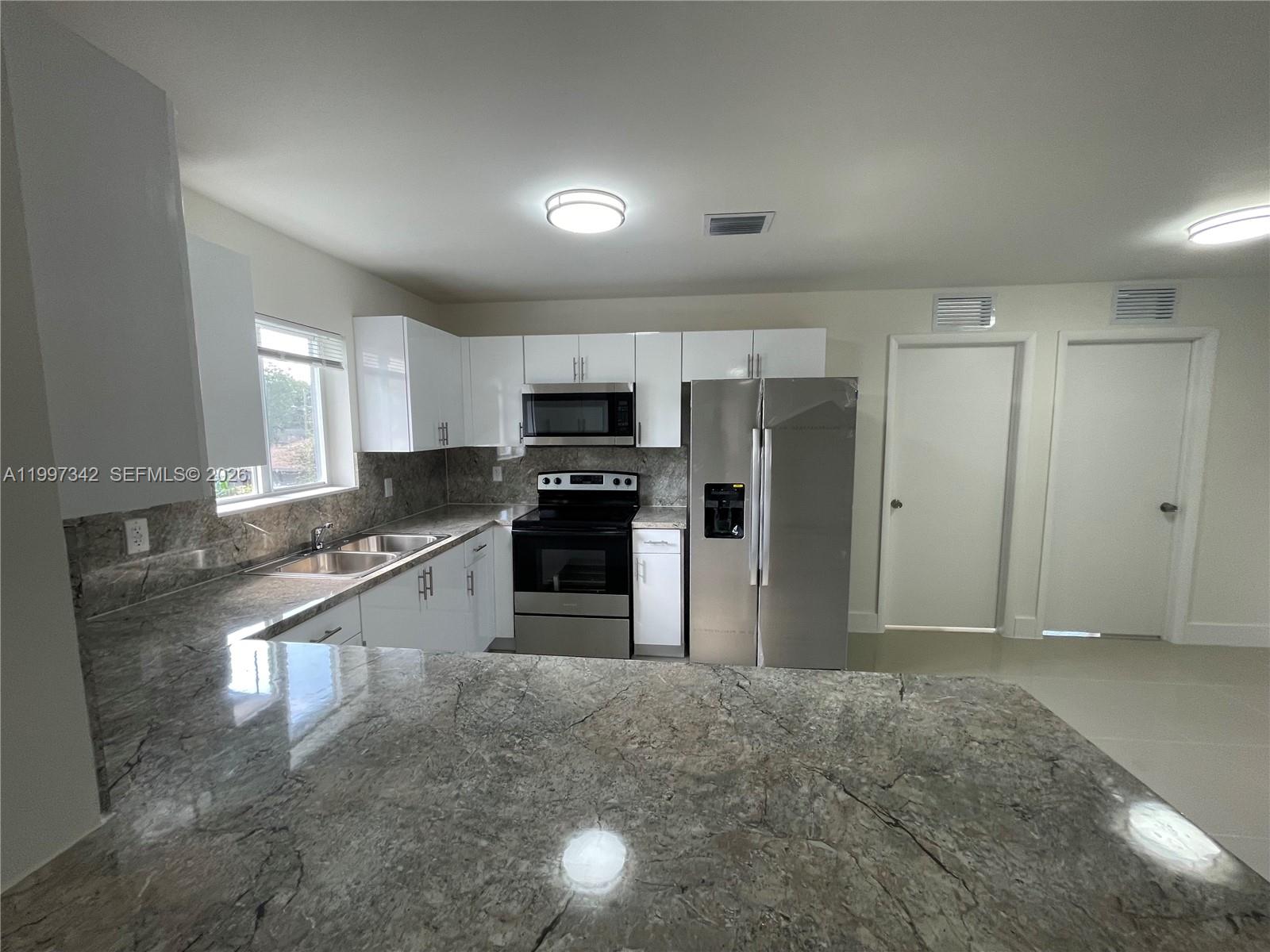 2268 Northwest 52nd Street, Unit TOP Miami, FL 33142 - Photo 4 of 10