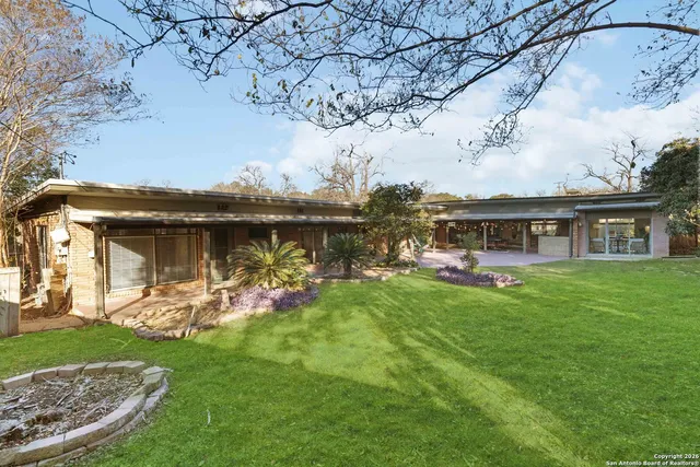 a view of a house with garden