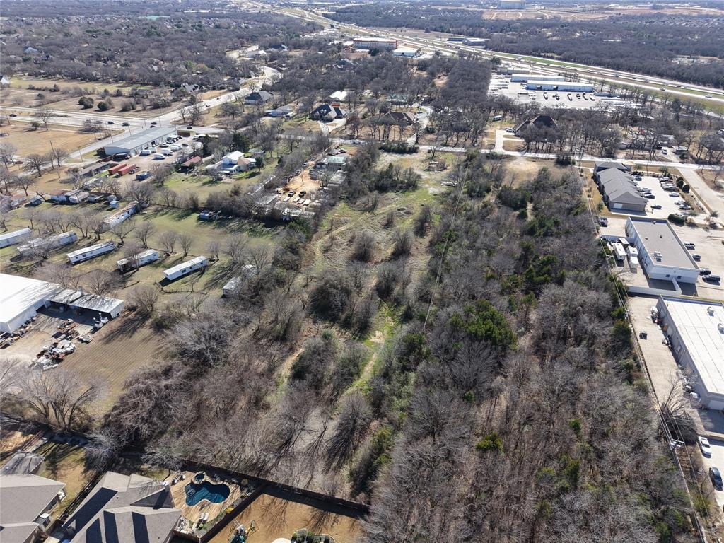 2809 Turner Warnell Road Arlington, TX 76001 - Photo 17 of 26 an aerial view of residential house with parking space