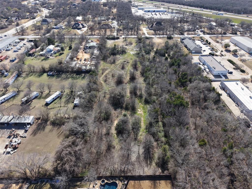 2809 Turner Warnell Road Arlington, TX 76001 - Photo 18 of 26 an aerial view of residential house with parking space