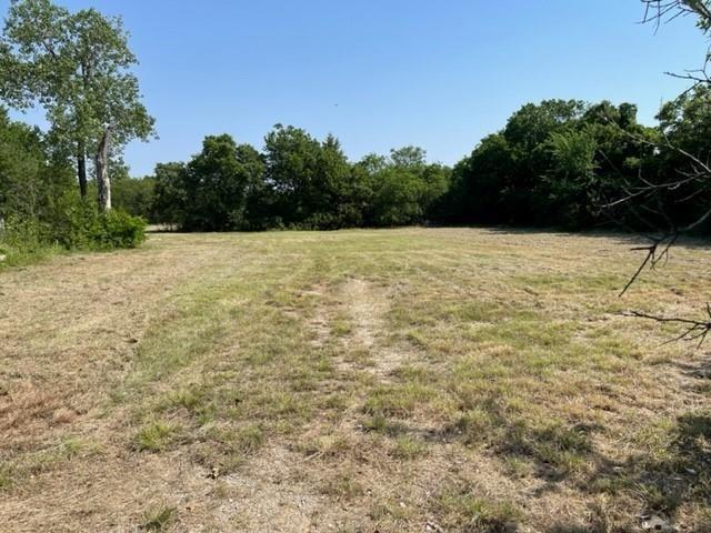 2809 Turner Warnell Road Arlington, TX 76001 - Photo 8 of 26 a view of a yard with an outdoor space