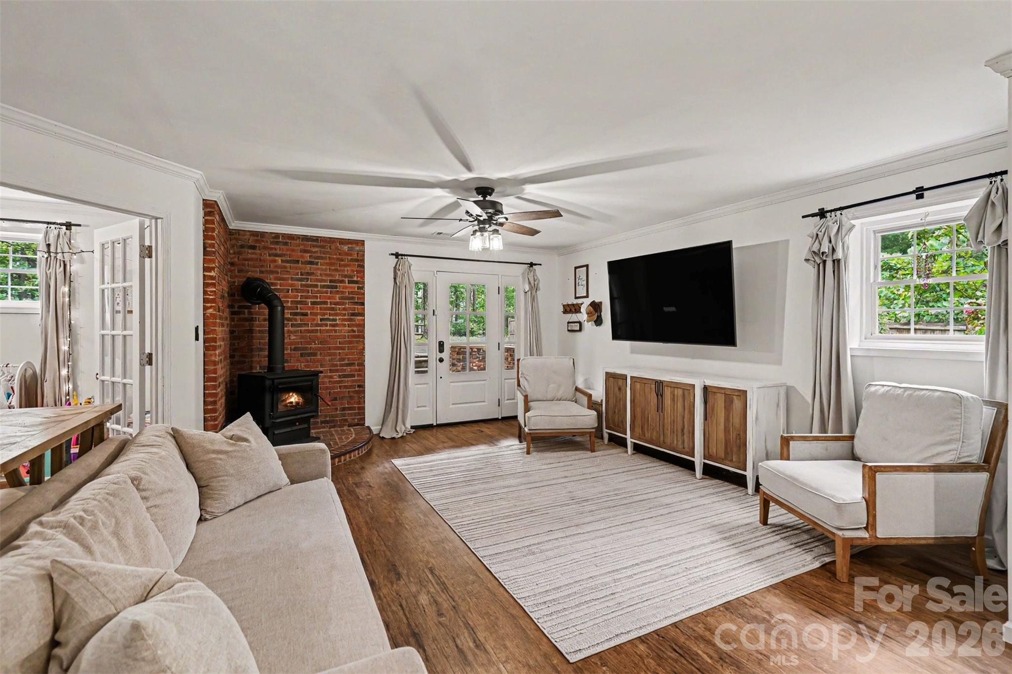 184 Canal Road Belmont, NC 28012 - Photo 21 of 39 a living room with furniture and a flat screen tv