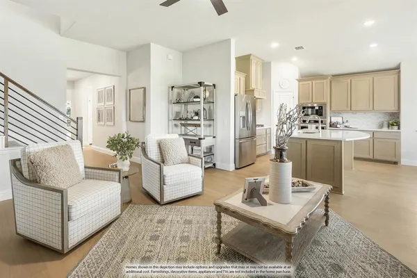 a living room with furniture and a table