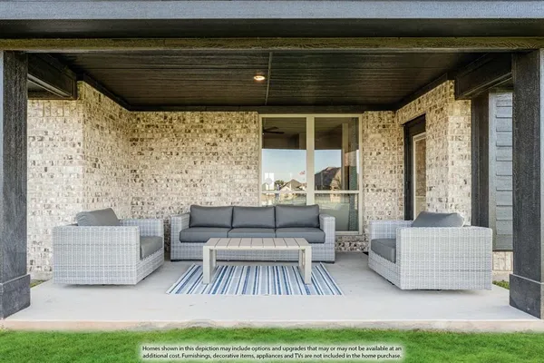 a view of living room couch and windows