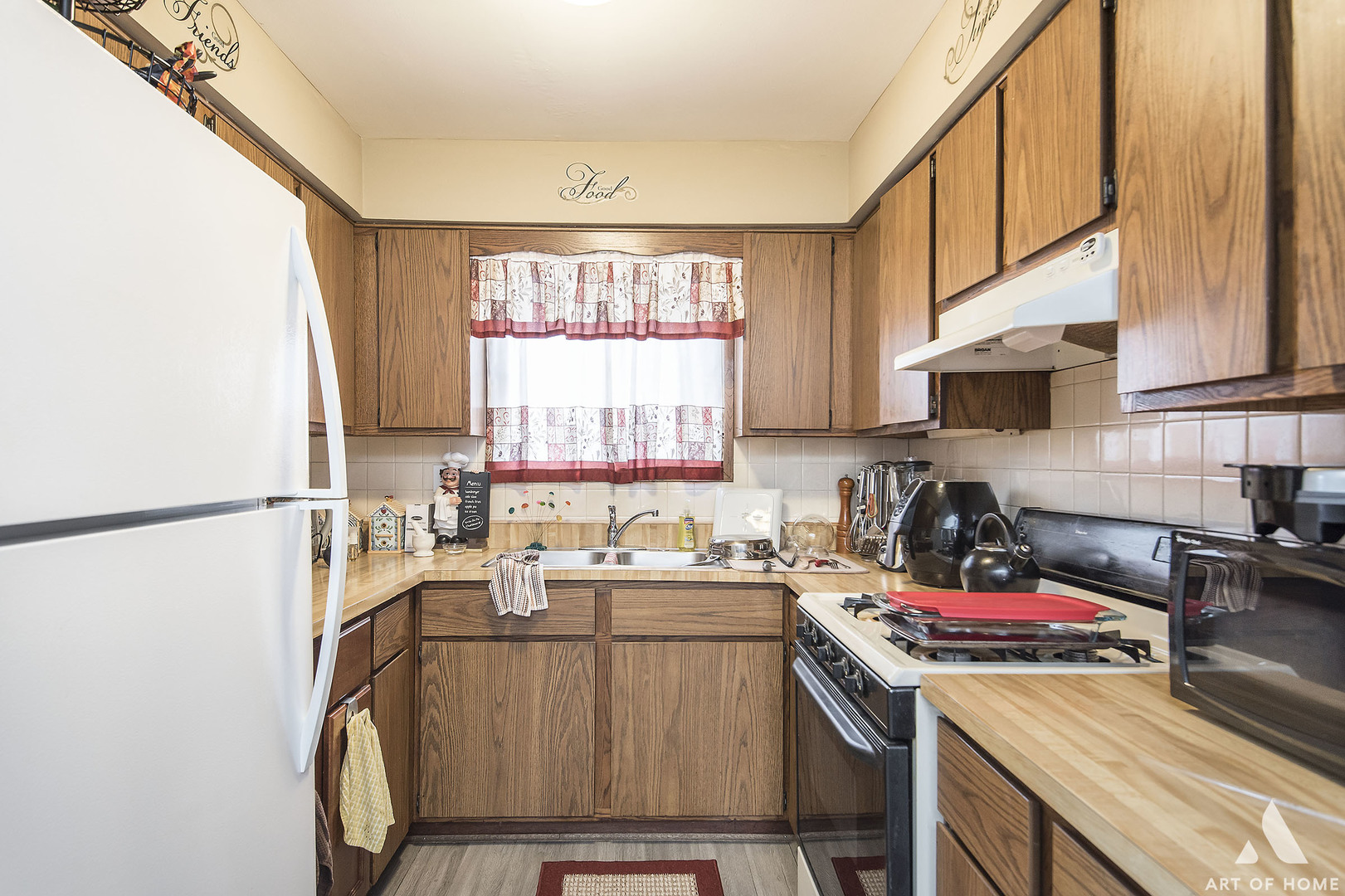5731 106th Street Chicago Ridge, IL 60415 - Photo 15 of 25 a kitchen with a sink stove and cabinets