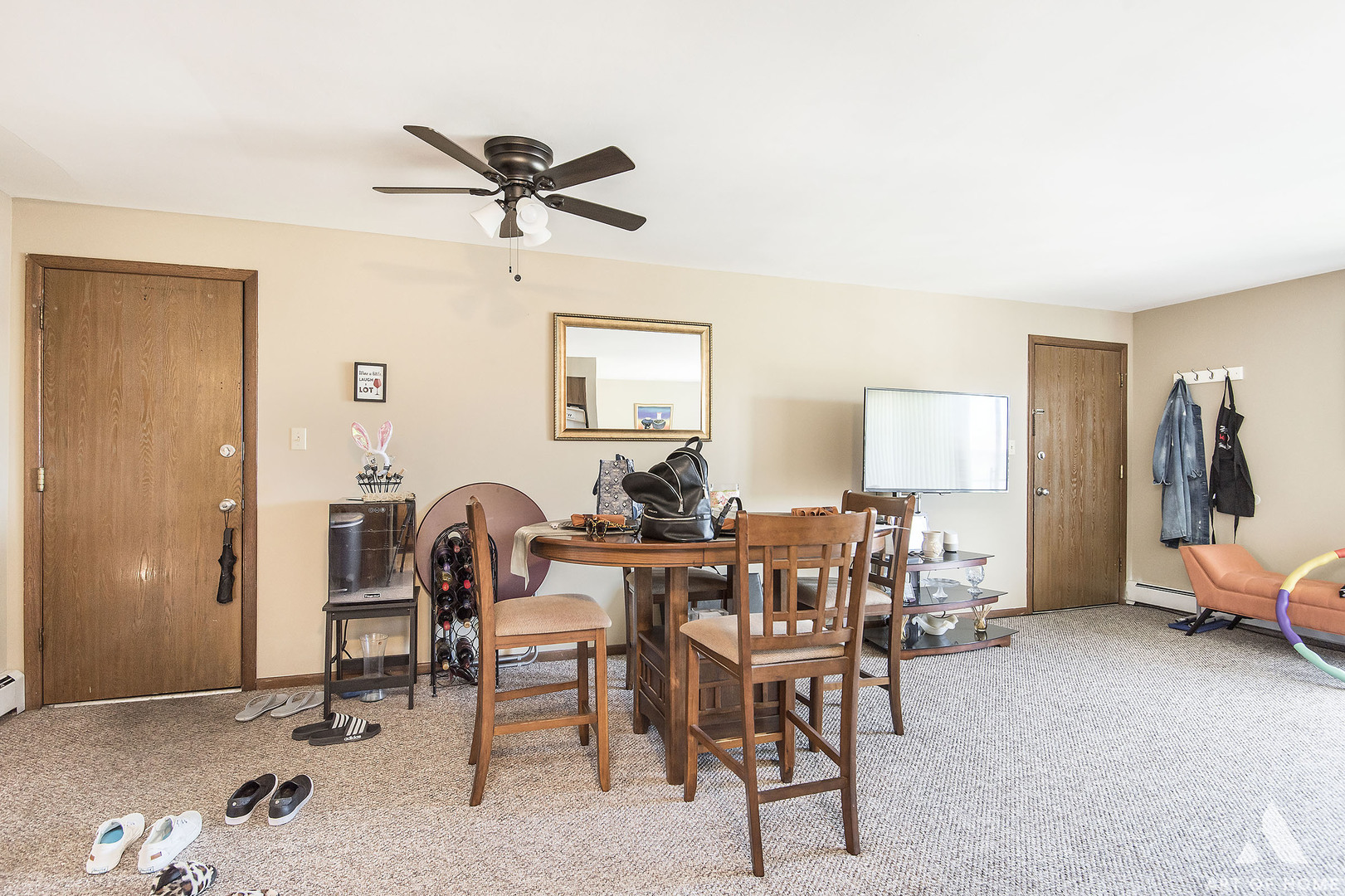 5731 106th Street Chicago Ridge, IL 60415 - Photo 10 of 25 a view of a dining room with furniture and a chandelier