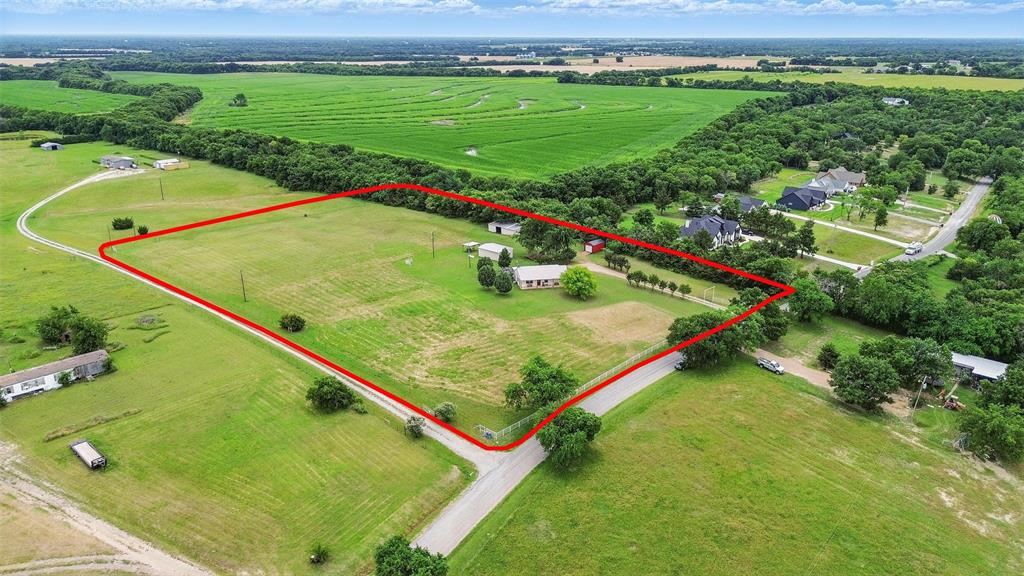 1256 Kentucky Town Road Whitewright, TX 75491 - Photo 1 of 1 Aerial view of property with approximate property boundaries highlighted. The large open field to the back is a 41 acre property that is also for sale by another property owner.
