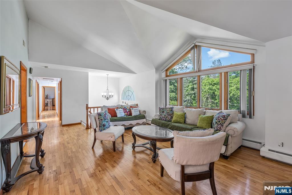 21 Marcia Road Ringwood, NJ 07456 - Photo 6 of 42 a living room with furniture and a large window