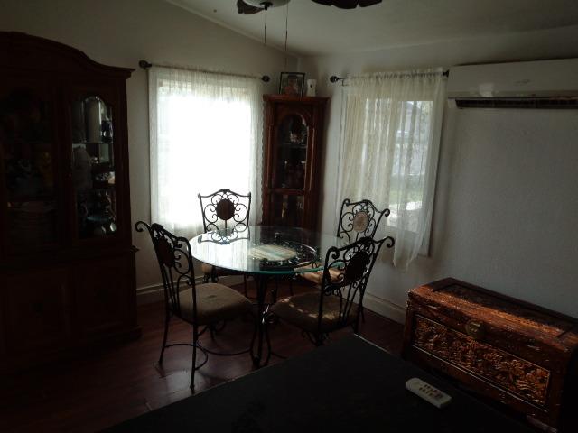 1084 Cyrier Avenue Reedley, CA 93654 - Photo 4 of 11 a dining room with furniture and window