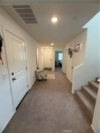 a view of a hallway with workspace