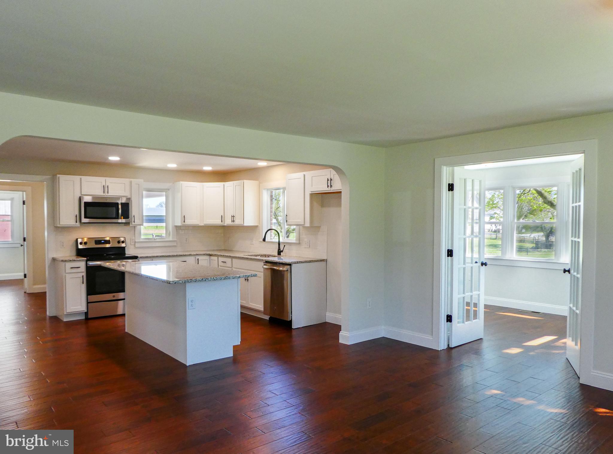 151 Buckwalter Road Lancaster, PA 17602 - Photo 12 of 64 Into Kitchen and Sun room from Dining
