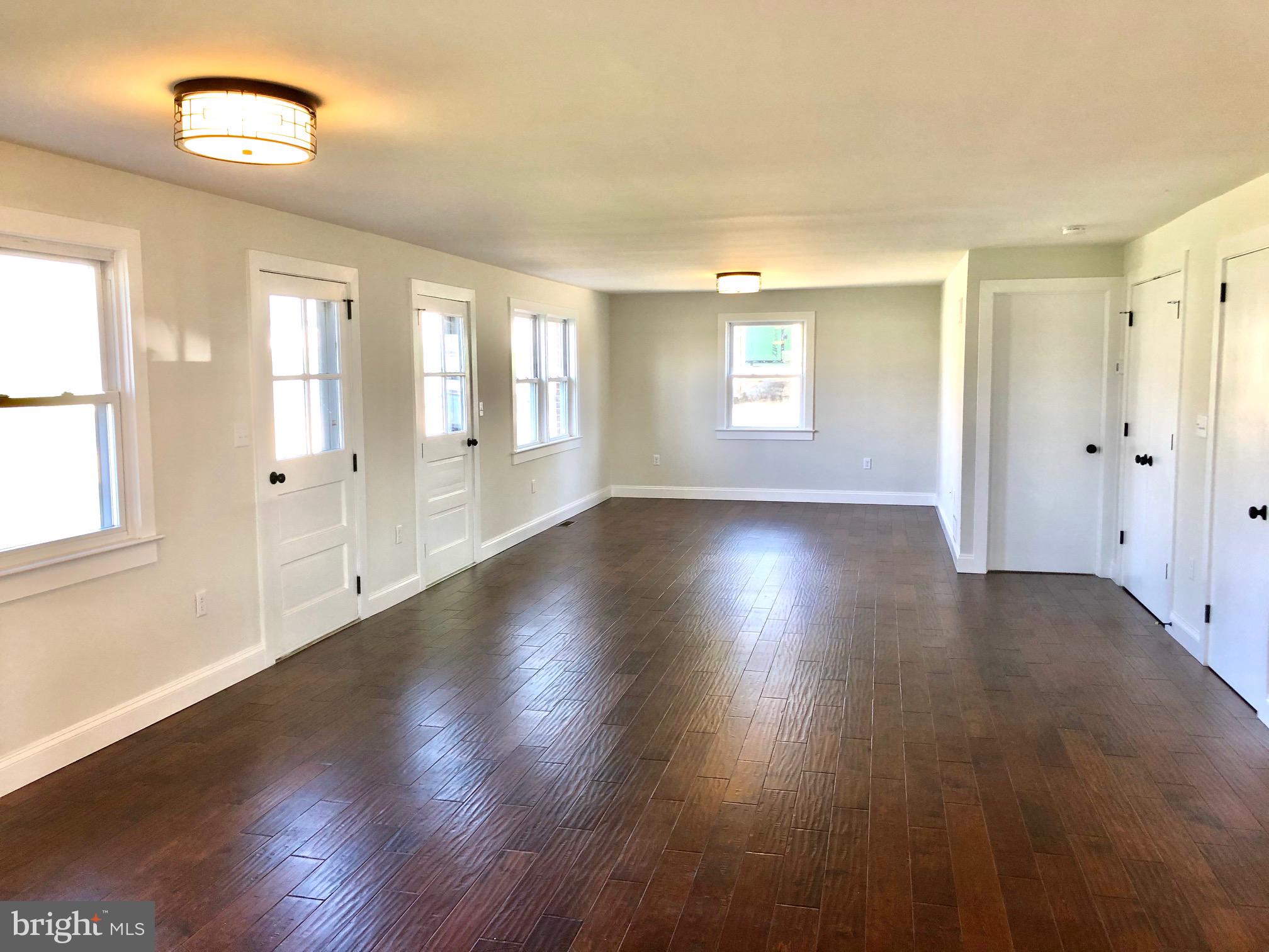 151 Buckwalter Road Lancaster, PA 17602 - Photo 15 of 64 From Sun room into Living Dining Area
