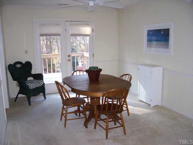 4609 Kresson Place Raleigh, NC 27616 - Photo 3 of 10 a dining room with furniture and window