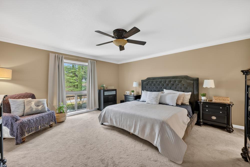 3340 Garden Bar Road Lincoln, CA 95648 - Photo 25 of 56 a bedroom with a bed and a couch