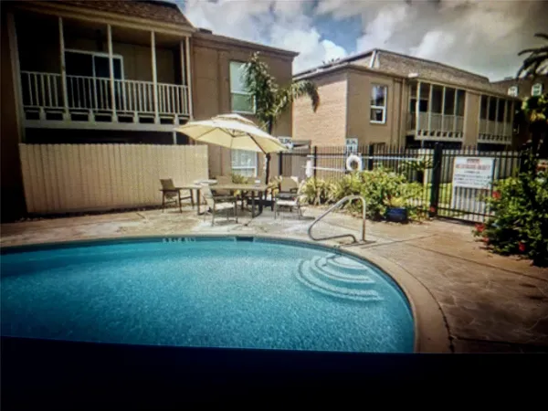 a front view of a house with patio