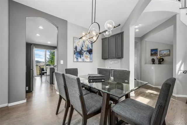 a bathroom with a toilet sink and shower