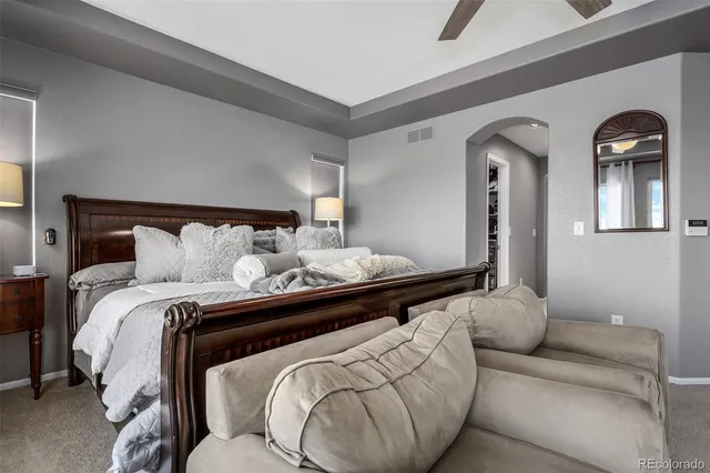 a kitchen with a sink a stove and a refrigerator