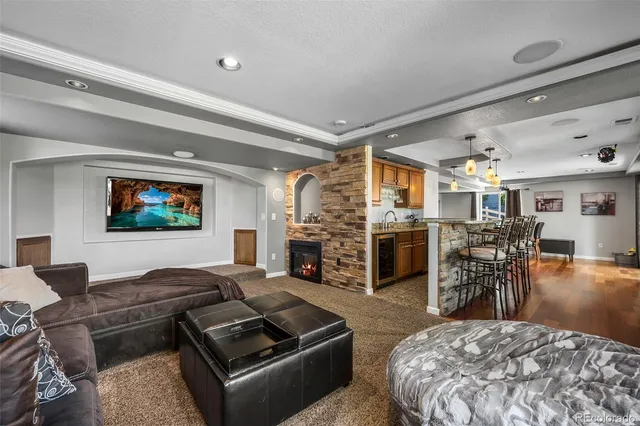 a view of a house with sitting area and garden