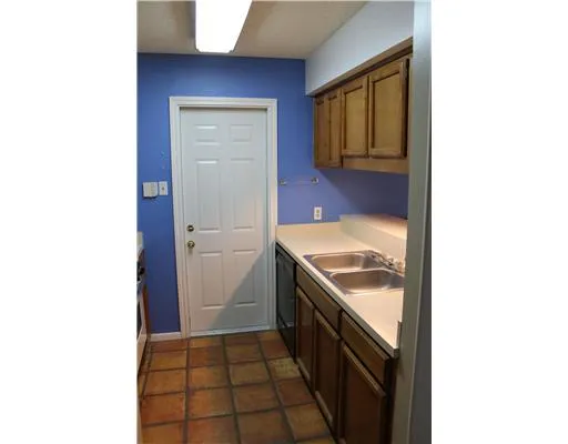 a kitchen with a stove and a microwave