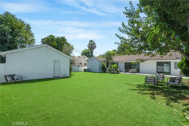 a house view with a garden space