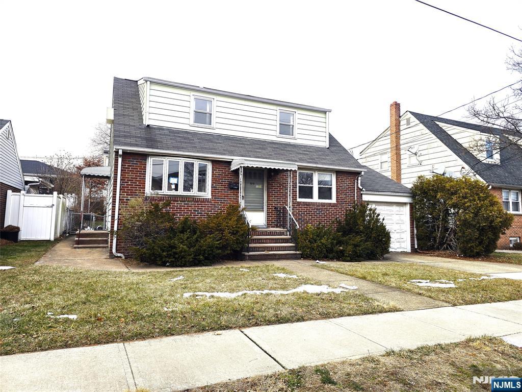 701 4th Street Secaucus, NJ 07094 - Photo 1 of 21 a view of a house with a yard