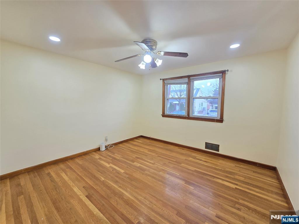 701 4th Street Secaucus, NJ 07094 - Photo 8 of 21 a view of an empty room with a window