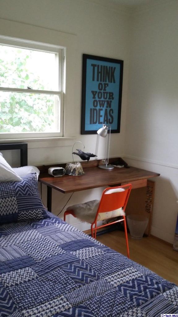 970 Cornell Road Pasadena, CA 91106 - Photo 12 of 14 a bedroom with bed and window