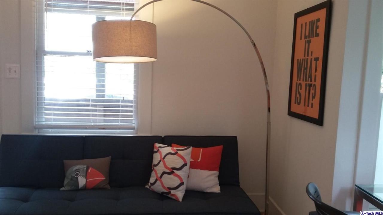 970 Cornell Road Pasadena, CA 91106 - Photo 7 of 14 a living room with furniture and a window