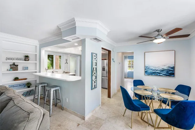 a view of a dining room with furniture