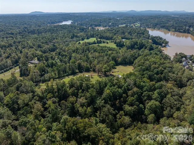 an aerial view of residential house and outdoor space