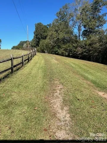 a view of a yard with an outdoor space