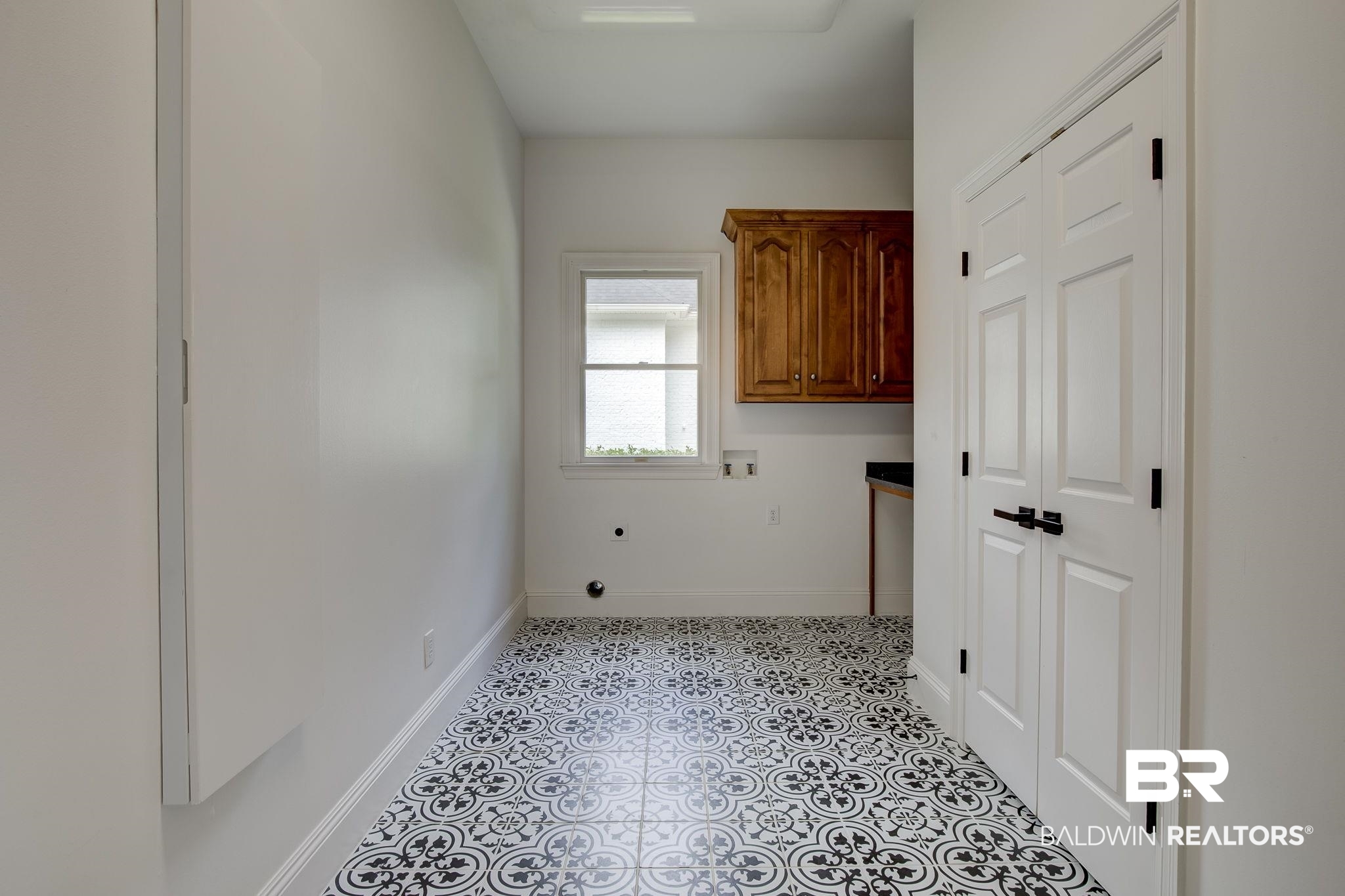 105 High Pines Ridge Fairhope, AL 36532 - Photo 61 of 97 Clothes washing area featuring cabinet space, hookup for a washing machine, baseboards, and electric dryer hookup