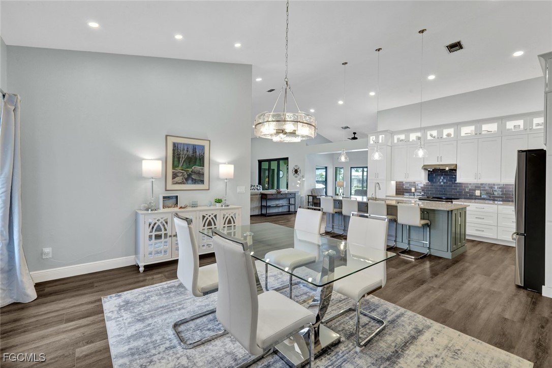5346 Southwest 10th Avenue Cape Coral, FL 33914 - Photo 13 of 50 a view of a dining area with furniture