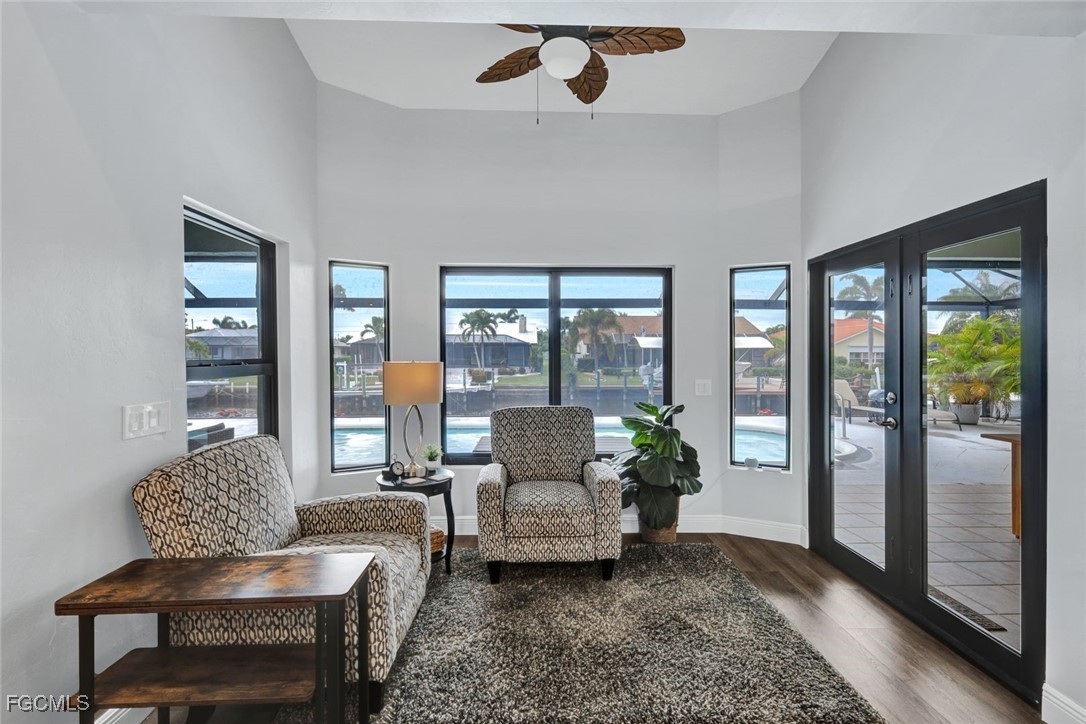 5346 Southwest 10th Avenue Cape Coral, FL 33914 - Photo 14 of 50 a living room with furniture and a potted plant
